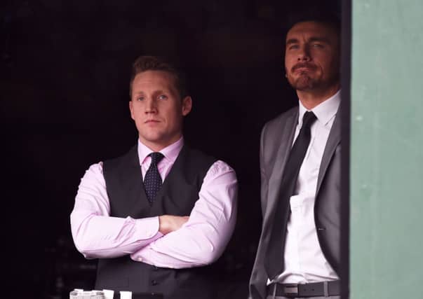 Kris Commons watches the St Jonstone game with Hull City's Robert Snodgrass. Picture: SNS