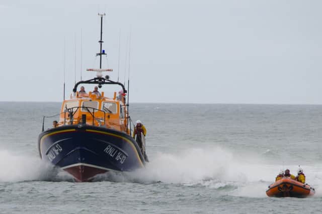 Tugs are expected to be used to try to free the ship and a lifeboat is standing by at the scene. Picture: Contributed
