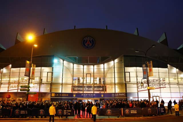 Fans wait outside the stadium prior to the match between Paris Saint-Germain and Chelsea at Parc des Princes. Picture: Getty