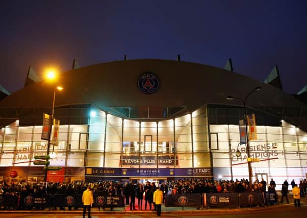Fans wait outside the stadium prior to the match between Paris Saint-Germain and Chelsea at Parc des Princes. Picture: Getty