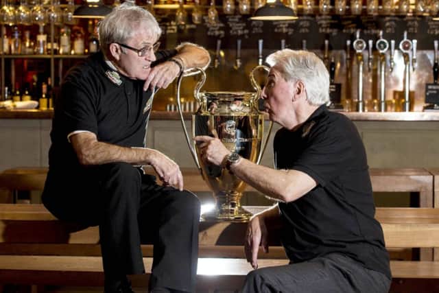 Bertie Auld, left, who wears his winners medal round his neck chats with Jim Craig. Picture: SNS