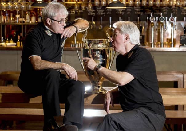 Bertie Auld, left, who wears his winners medal round his neck chats with Jim Craig. Picture: SNS