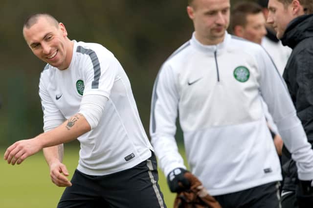 Midfielder Scott Brown enjoys a light-hearted moment in training. Picture: SNS