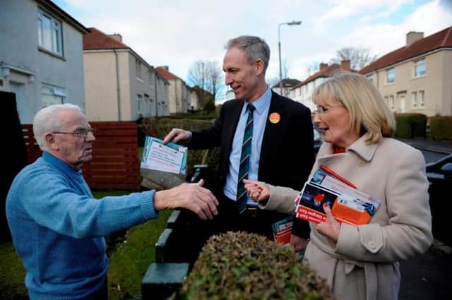Class warrior: Jim Murphy  shown here campaigning in Glasgow with Margaret Curran. Picture: Hemedia