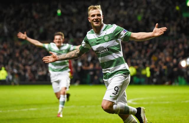 John Guidetti celebrates after netting a last-gasp equaliser for Celtic. Picture: SNS