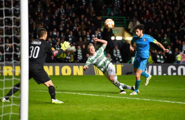 Celtic striker John Guidetti scores deep into injury time to salavage a 3-3 draw with Inter Milan. Picture: SNS