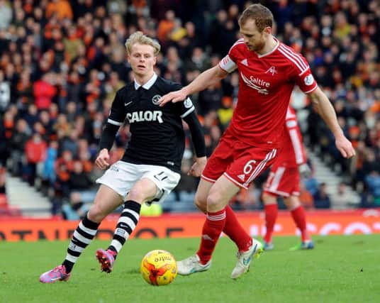 Aberdeen centre-back Mark Reynolds, right, sticking to 'one game at a time' mantra. Picture: Lisa Ferguson