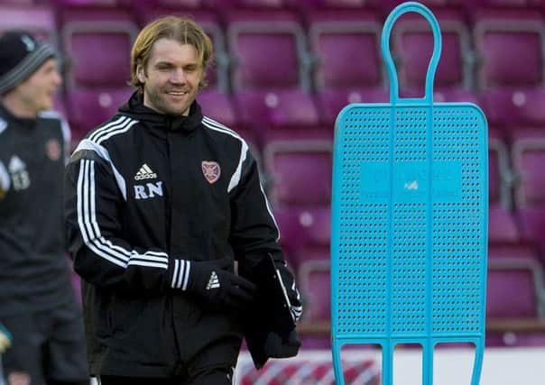Hearts manager Robbie Neilson was in good spirits at training yesterday. Picture: SNS