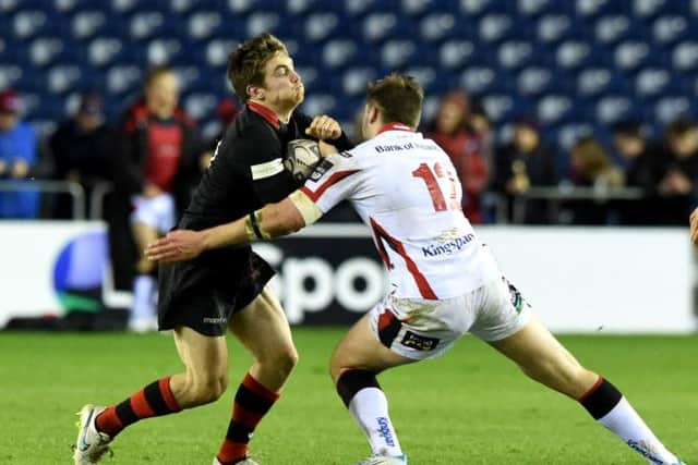 Tom Heathcote (left) faces a challenge from Ulster's Stuart McCloskey. Picture: SNS