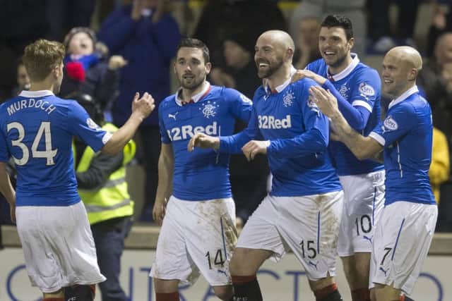 Rangers celebrate but the club face a probe into sectarian singing. Picture: PA