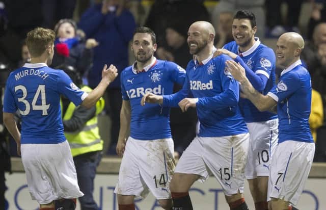 Rangers celebrate but the club face a probe into sectarian singing. Picture: PA