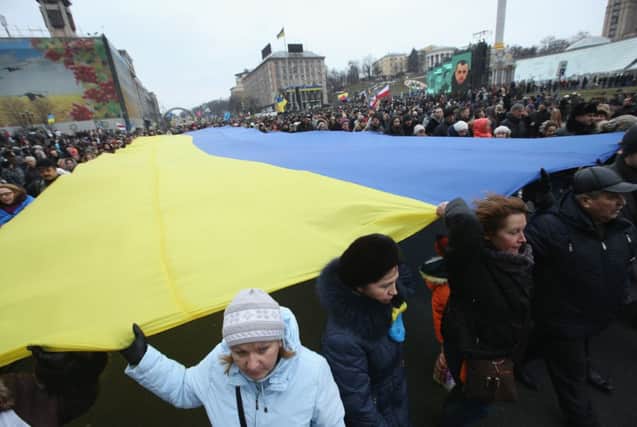 Marchers in Kiev mark a year since president Viktor Yanukovych was ousted. Picture: Getty