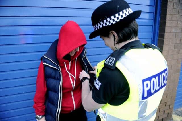 The poll shows over half of Scots back the controversial stop and search policy. Picture (posed by models): John Devlin