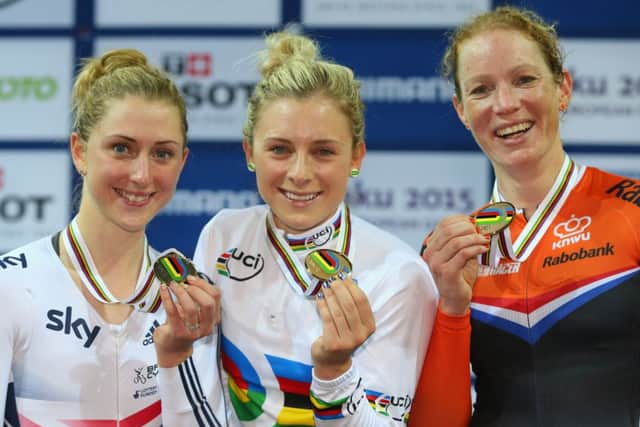 Omnium winner Annette Edmondson is flanked by silver medallist Laura Trott, left, and Kirsten Wild (bronze). Picture: Getty