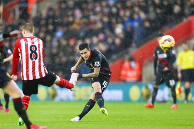 Liverpool's Brazilian midfielder Philippe Coutinho fires in a superb long-range strike. Picture: PA