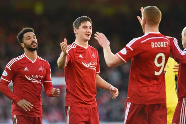 Adam Rooney, right, celebrates with team-mate Kenny McLean after putting Aberdeen 2-0 up. Picture: SNS