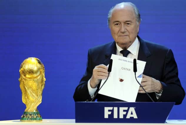 FIFA President Sepp Blatter revealing Qatar as 2022 World Cup host country. Picture: Getty