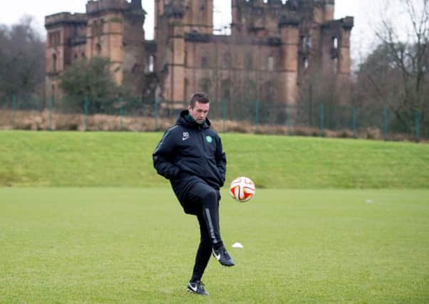 Ronny Deila looks relaxed as he trains his Celtic squad ahead of his side's UEFA Europa League fixture with Inter Milan. Picture: SNS