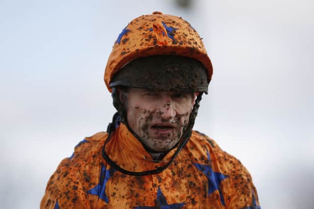 It was mud, glorious mud at Plumpton yesterday as rider Andrew Thornton quickly found out. Picture: Getty