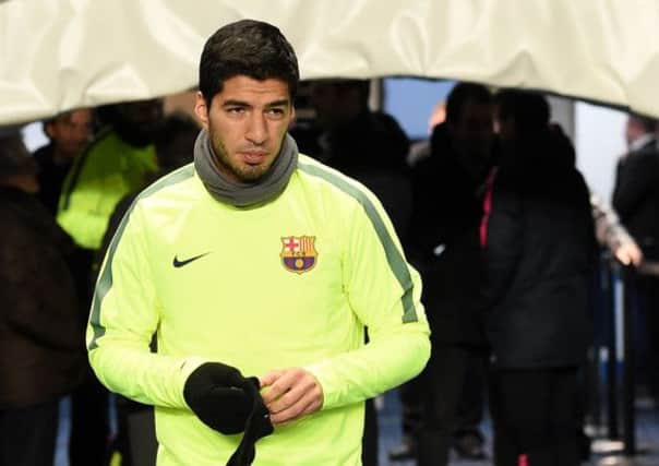 Luis Suarez is back in England for the first time since he left Liverpool for Barcelona. Picture: PA