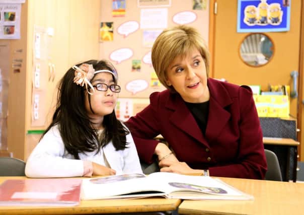 Nicola Sturgeon chats to pupils at Blue Gate Fields Junior School in Tower Hamlets, London. Picture: Getty