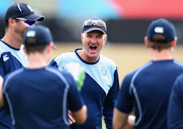 Scotland coach Grant Bradburn shares a joke with his players. Picture: Getty