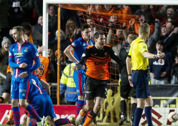 Dundee Utd's Ryan McGowan celebrates after he levels the score for his side. Picture: SNS