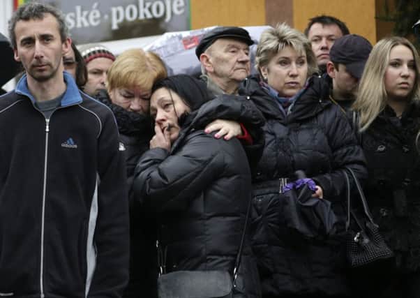 Residents pay respect to victims of the shooting in Uhersky Brod. Picture: AP