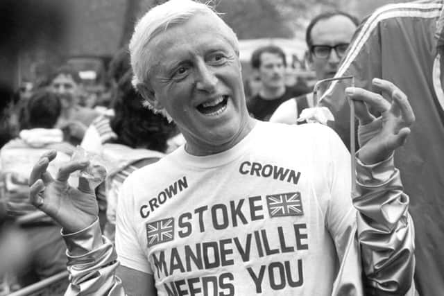 Jimmy Savile wears a Stoke Mandeville t-shirt in 1981. Picture: PA