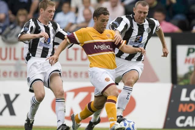 Scott McDonald battles with Kevin McGowne and David Van Zanten of St Mirren at a match in 2006. Picture: SNS