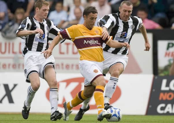 Scott McDonald battles with Kevin McGowne and David Van Zanten of St Mirren at a match in 2006. Picture: SNS