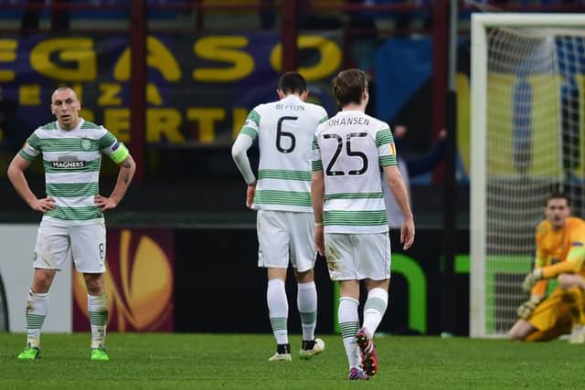 Celtic players are a picture of dejection after Fredy Guarin's late goal. Picture: Getty
