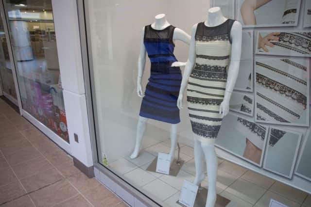 The Royal Blue Lace Detail Bodycon Dress on sale at Roman Originals in Wolverhampton. Picture: Henry Nicholls