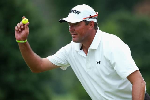 Wallie Coetsee of South Africa acknowledges his home crowd after shooting a 65. Picture: Getty
