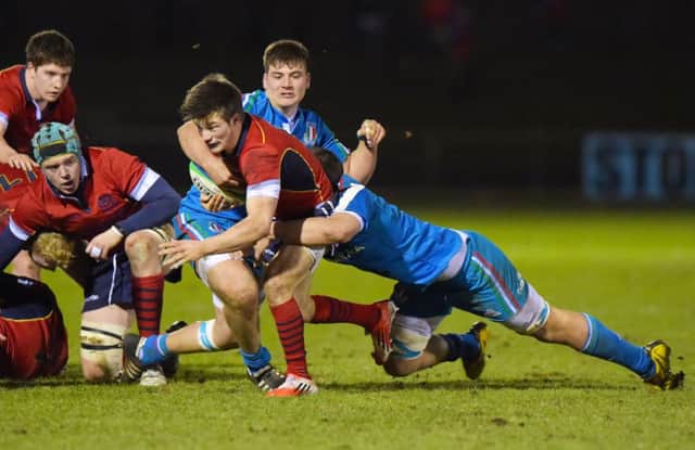 George Horne, brother of Scotland stand-off Peter, on the attack for Scotland Under 20s at Netherdale last night. Picture: SNS