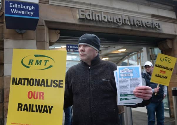 RMT Union members at Edinburgh Waveley station today. 
Picture: Neil Hanna.