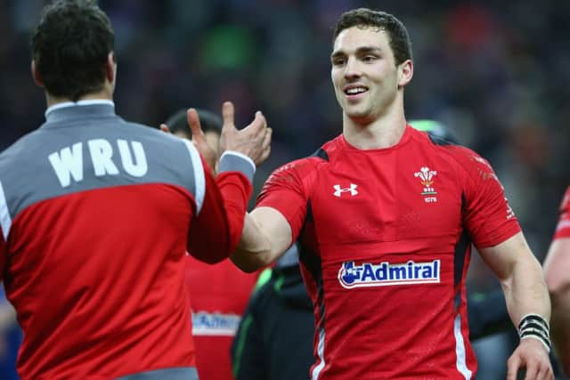 George North celebrates with Mike Phillips. Picture: Getty