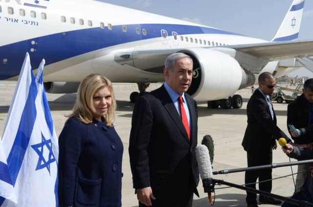 Mr Netanyahu and wife Sarah leave Tel Aviv yesterday to travel to Washington. Picture: Getty