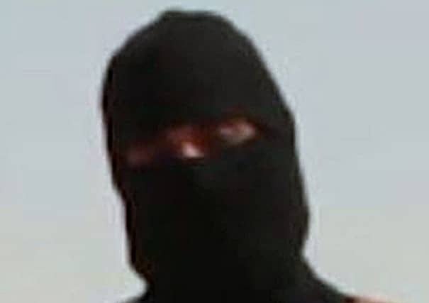 Jihadi John seen in videos of hostage executions by IS. Picture: PA
