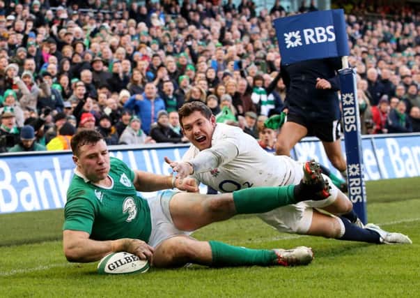 Robbie Henshaw, of Ireland, touches down the ball to score the only try of the game. PicturE: Getty