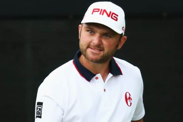 Andy Sullivan celebrates his final putt on the 18th green. Picture: Getty