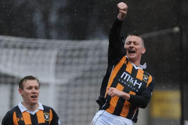Derek Riordan celebrates his late winner. Picture: George McLuskie