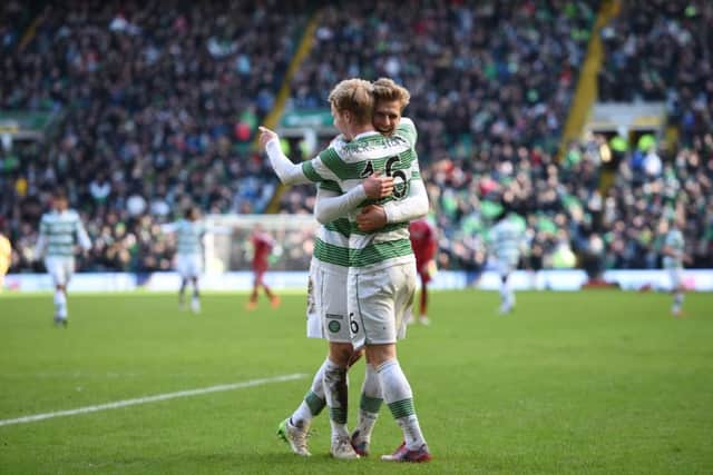 Gary Mackay-Stevencelebrates his goal against  Aberdeen  with Celtic team-mate Stuart Armstrong. Picture: SNS