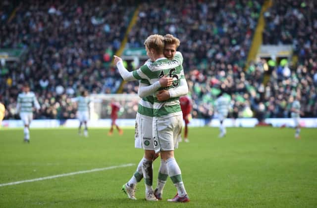 Gary Mackay-Stevencelebrates his goal against  Aberdeen  with Celtic team-mate Stuart Armstrong. Picture: SNS
