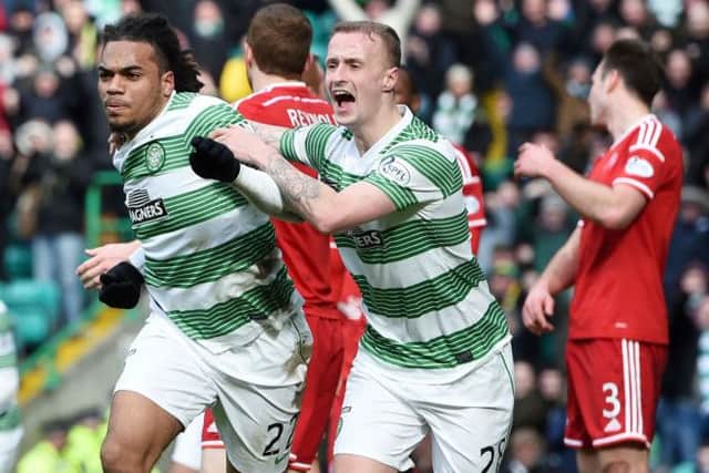 Jason Denayer (L) celebrates opening the scoring in Celtic's 4-0 win over Aberdeen. Picture: SNS