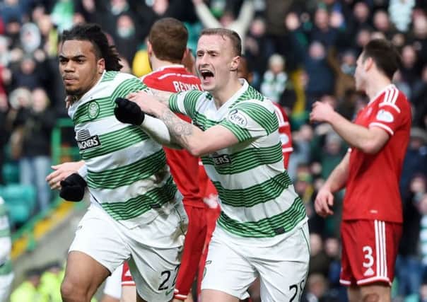 Jason Denayer (L) celebrates opening the scoring in Celtic's 4-0 win over Aberdeen. Picture: SNS