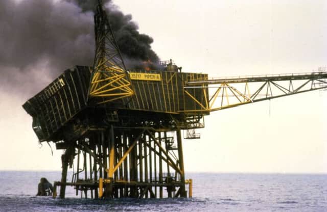 The North Sea Piper Alpha oil rig off the coast of Aberdeen after it caught fire. Picture: PA