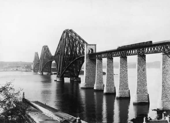 On this day in 1890 the Forth Bridge was officially opened by the Prince of Wales, who drove home the final rivet. Picture: Getty