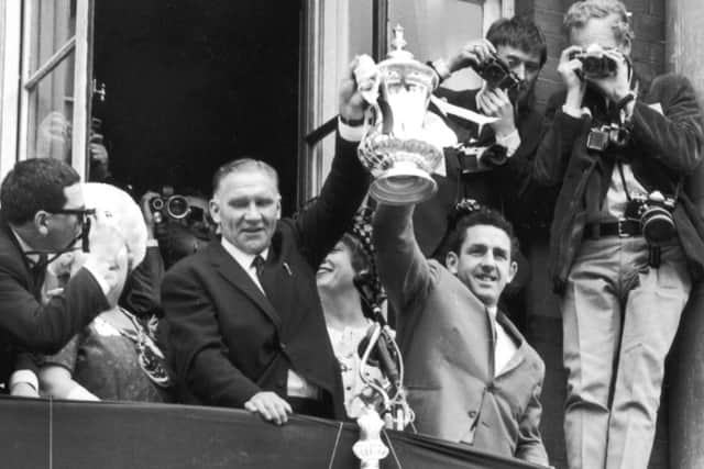 Billy Nicholson (left) and Dave Mackay with the FA Cup in 1967. Picture: Getty