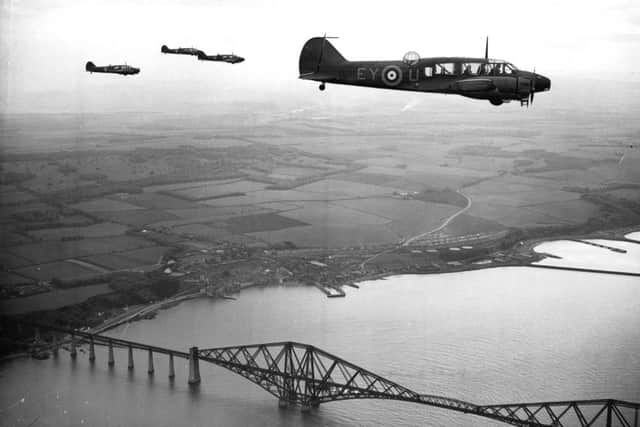 Avro Anson Bombers fly over the Forth Rail Bridge in May 1939